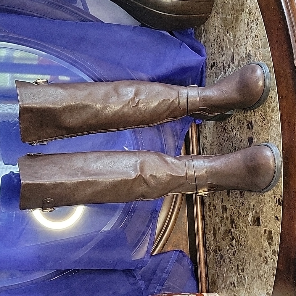 Brown leather boots.